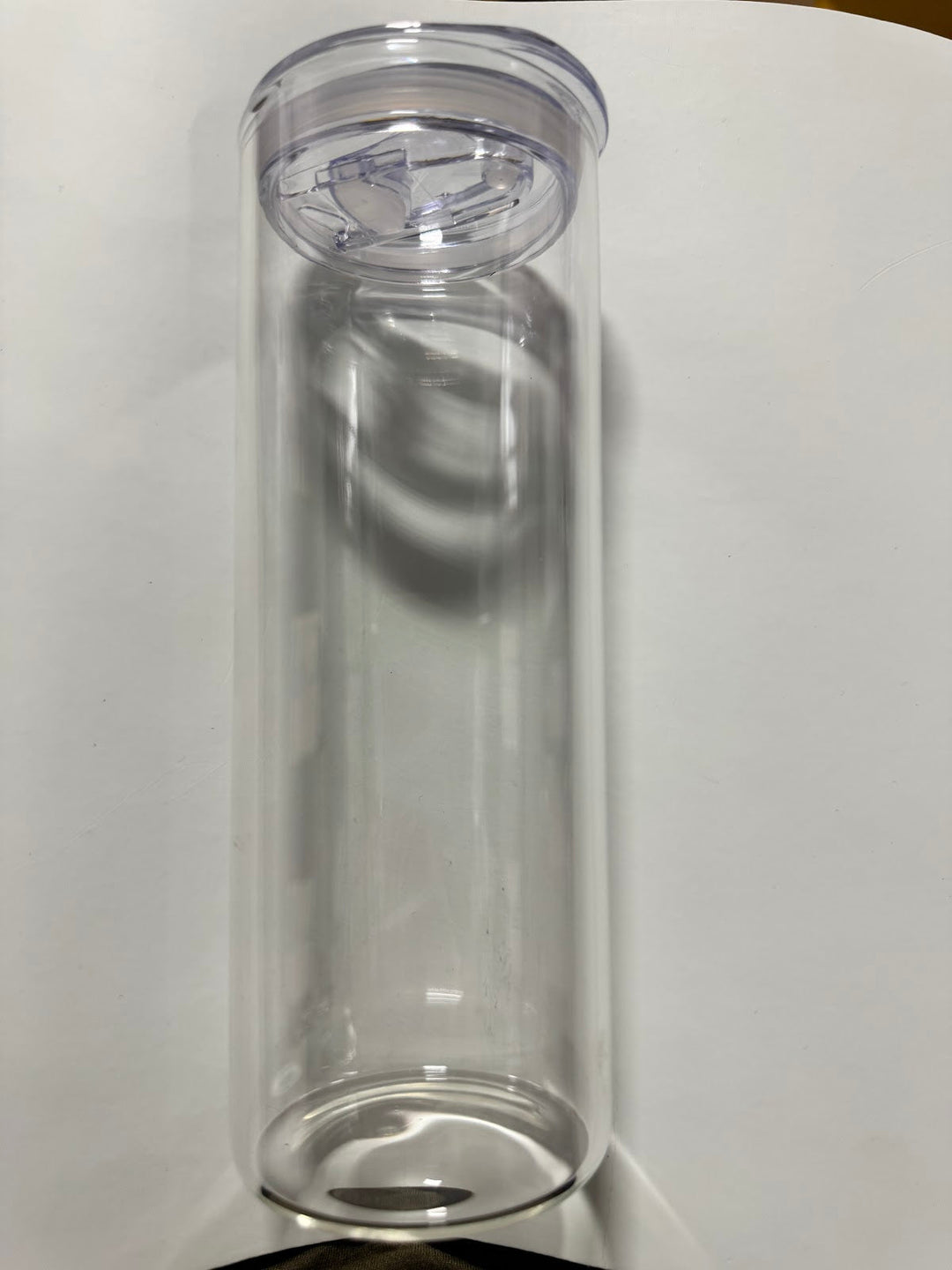 Clear glass can-shaped tumbler with a clear plastic sip lid