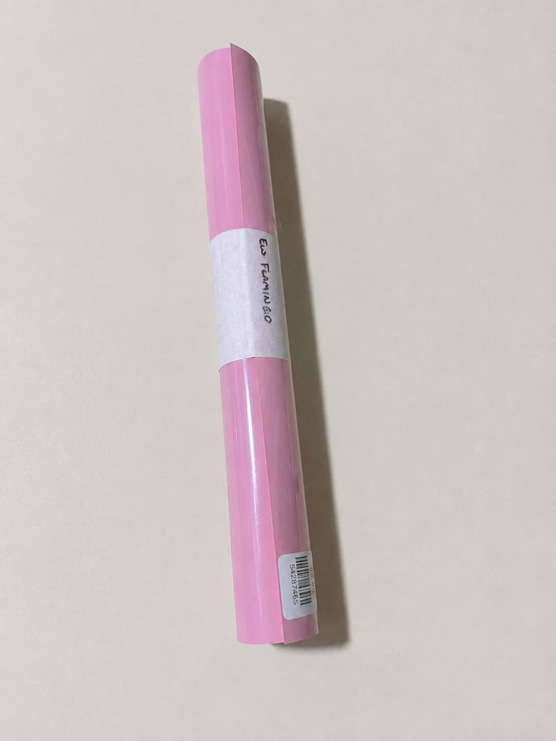 Roll of Siser EasyWeed heat transfer vinyl in Flamingo, a medium candy pink