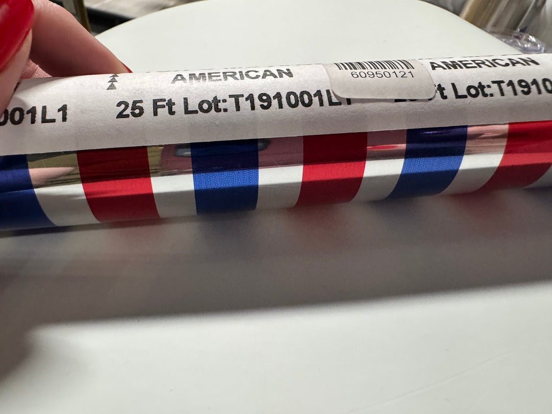 Roll of StarCraft Electra Foil in American Stripe with red, white and blue vertical stripes