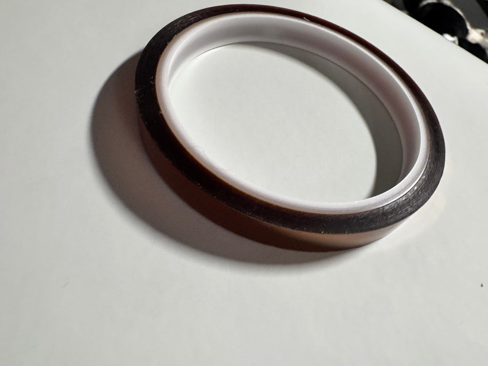 Second view of the unlabelled amber polyimide tape roll