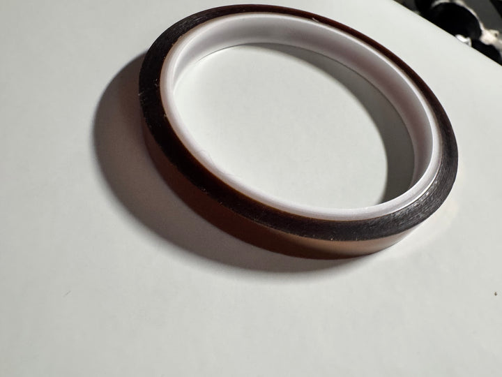 Second view of the unlabelled amber polyimide tape roll