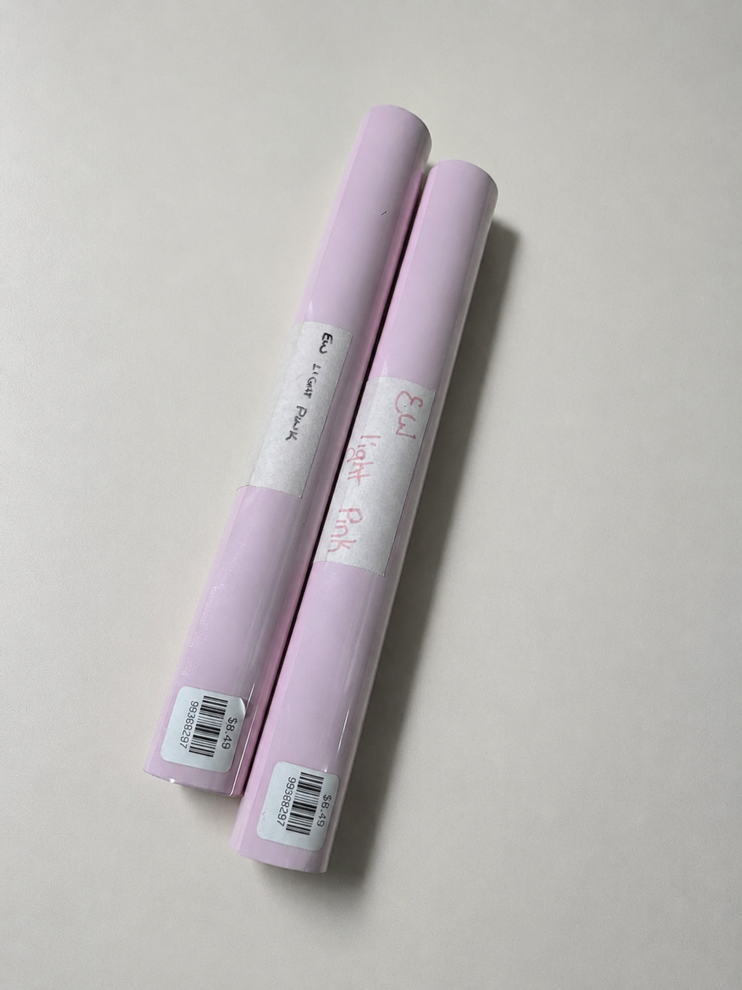 Rolls of Siser EasyWeed heat transfer vinyl in Light Pink, a soft pale pink