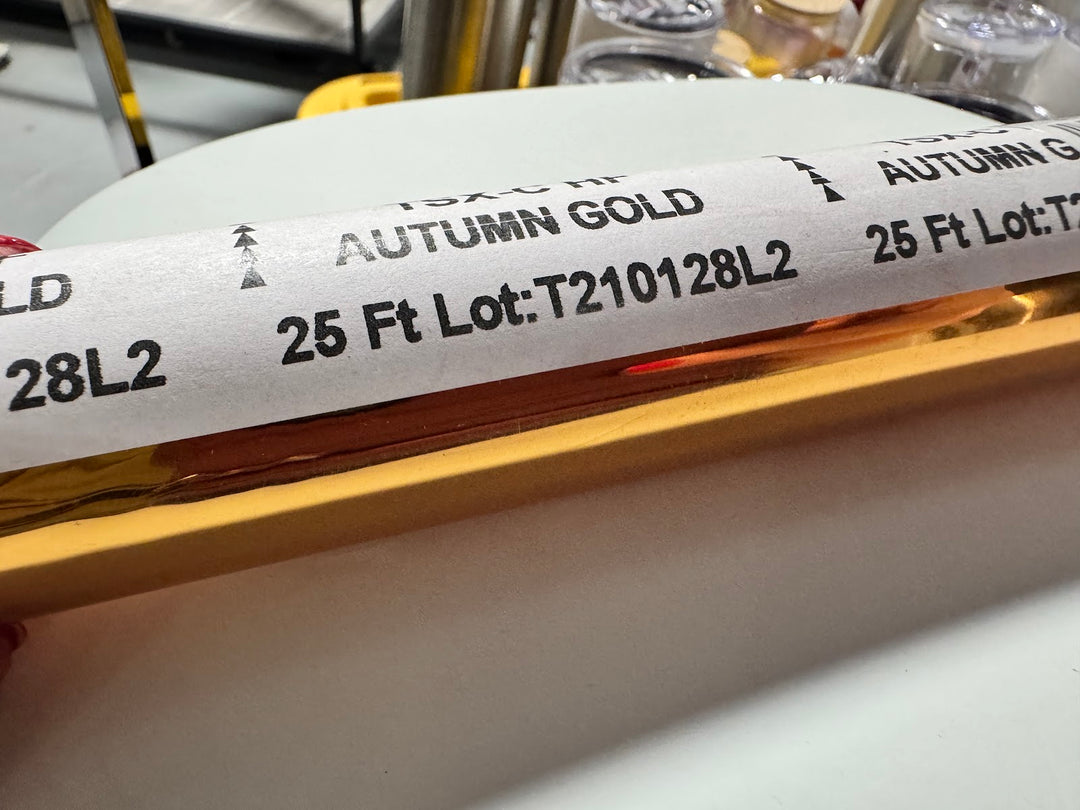 Roll of StarCraft Electra Foil in Autumn Gold with a deep amber-gold mirror finish