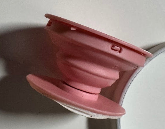 Second view of the pink collapsible phone grip blank showing the 3M adhesive base