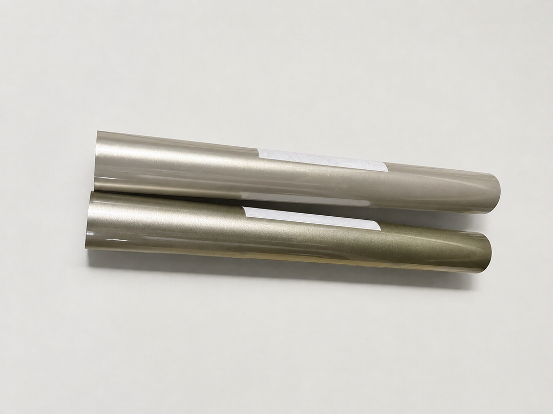 Rolls of Siser EasyWeed heat transfer vinyl in Champagne Metallic, a warm brushed metallic