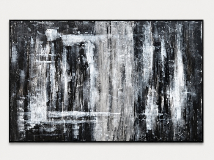 Black and white vertical drip abstract in a black frame