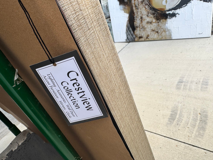 Crestview Collection hang tag attached to the stretcher bar