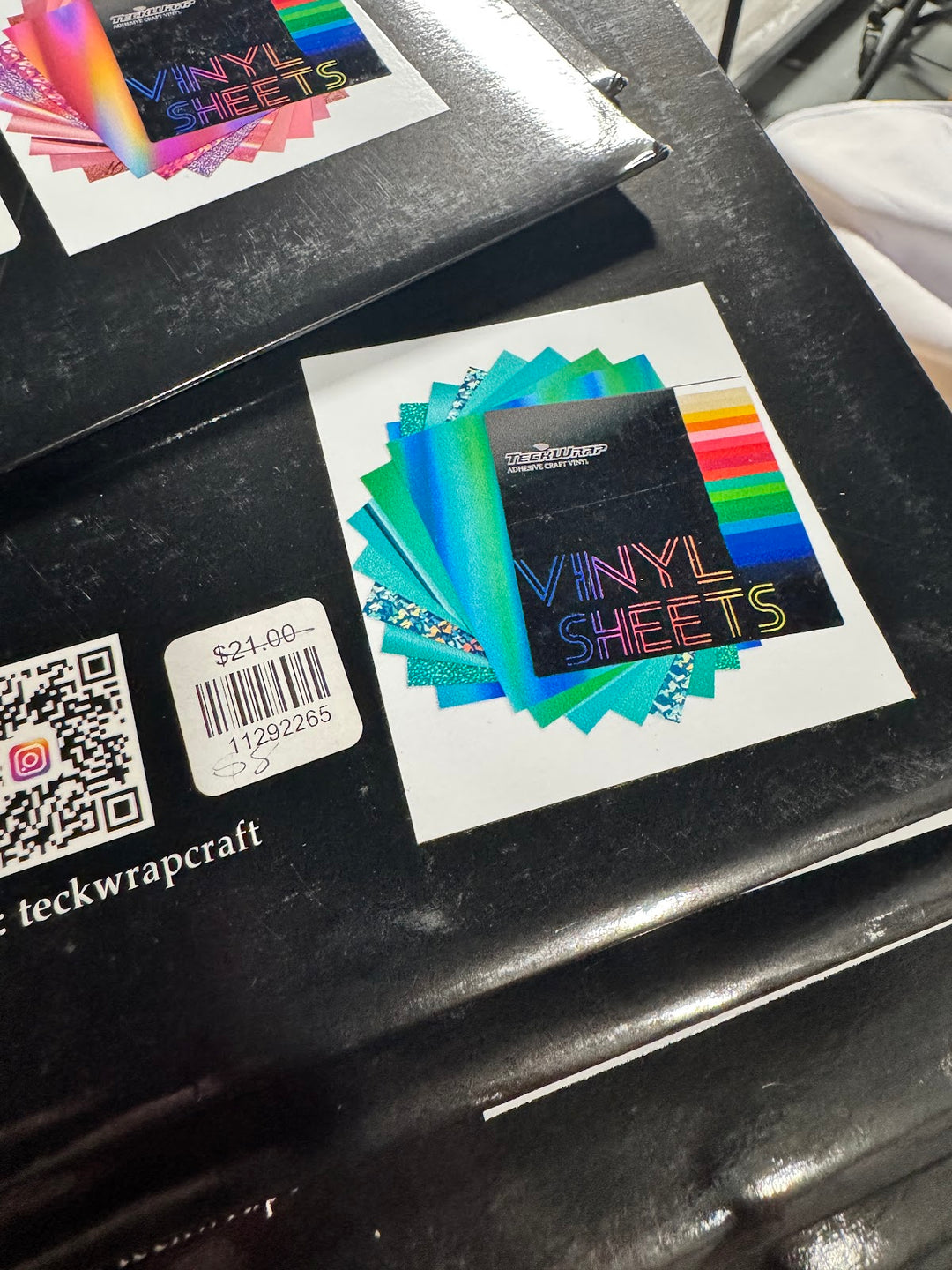 Sealed TeckWrap Craft pack of 12 by 12 inch adhesive vinyl sheets in assorted teal and green with rainbow holographic
