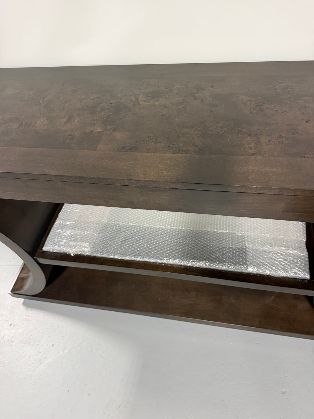 66″ Dark Brown Console Table with Sculptural Curved Base