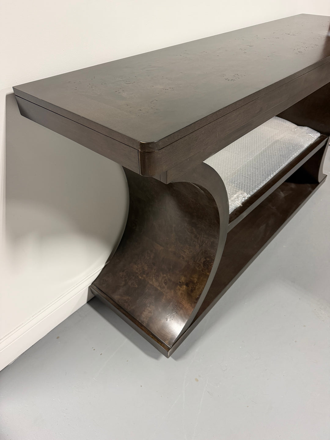 66″ Dark Brown Console Table with Sculptural Curved Base