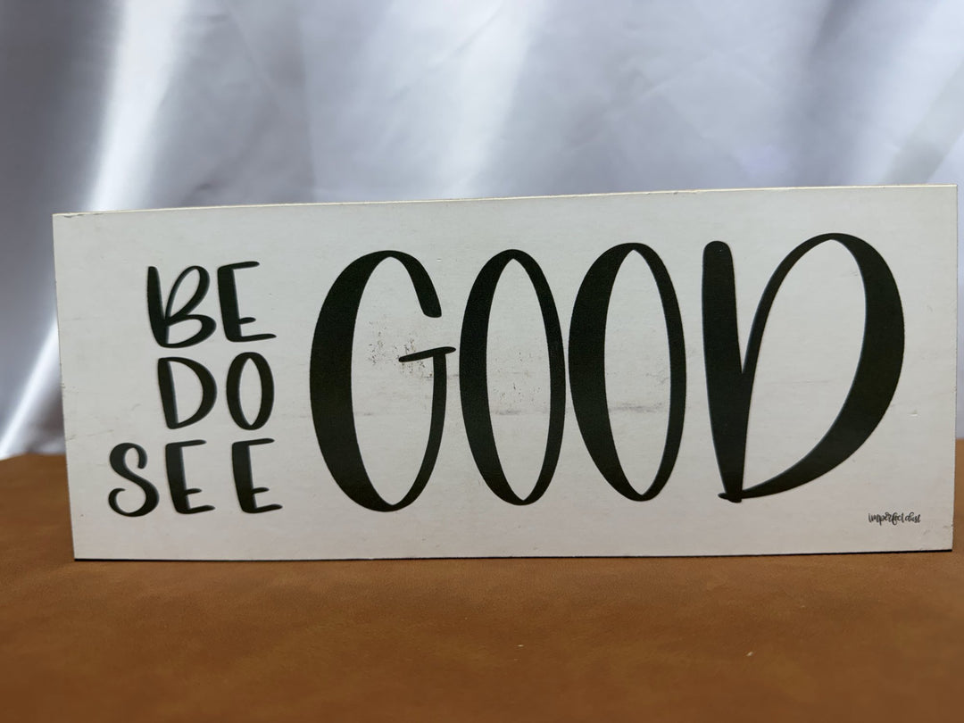 Wood sign reading Be Do See Good