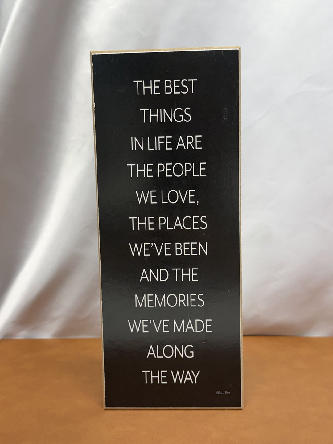 Wood sign with quote about the best things in life
