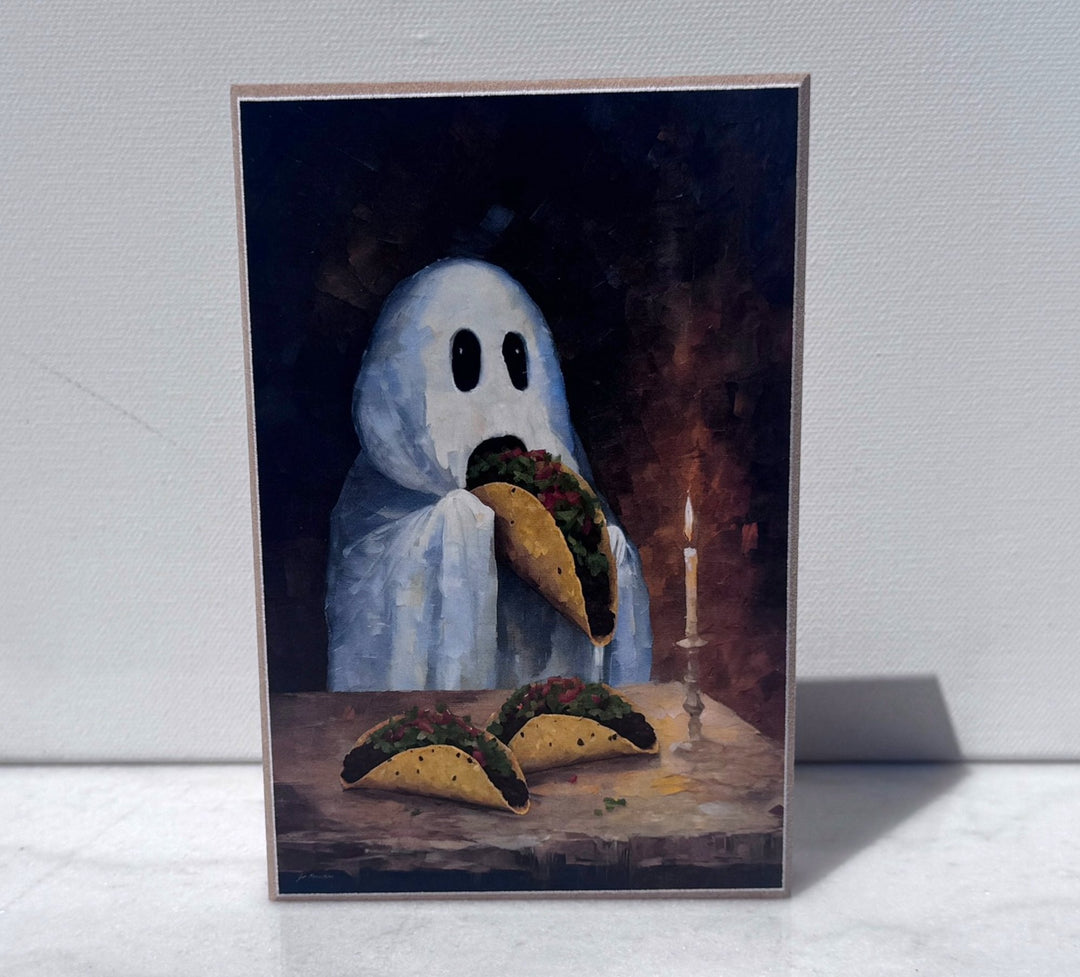 Ghost eating tacos by candlelight canvas print