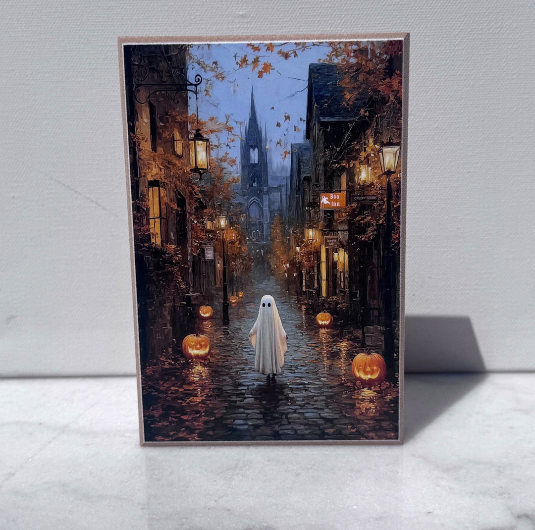 Ghost walking a lantern-lit village street canvas print