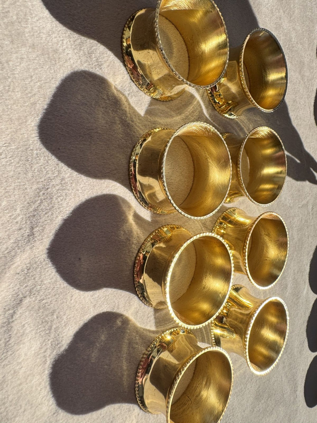 Lot 24 – Gold Metal Beaded Edge Napkin Rings, Set of 8