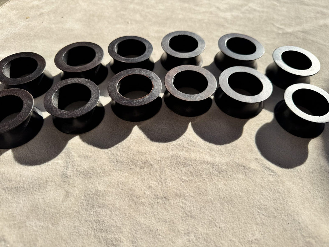 Lot 27 – Black Wood Flared Napkin Rings, Set of 12