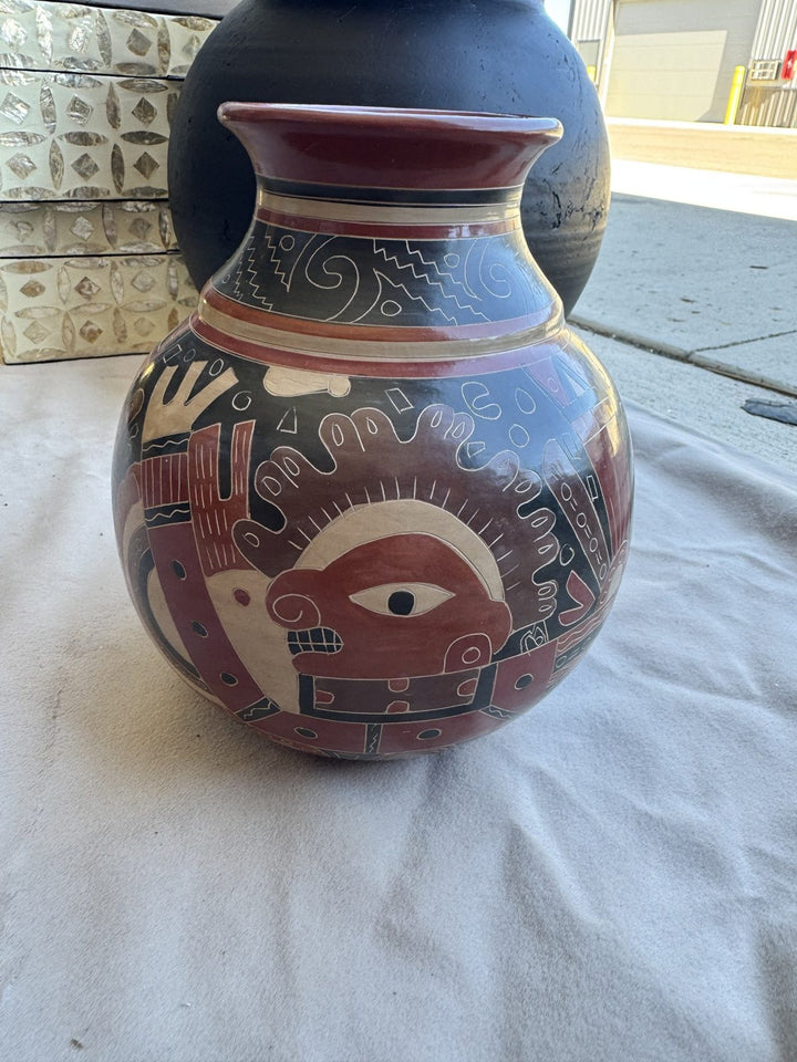 Lot 68 – Signed Nicaraguan Hand-Carved Pottery Vase, 9 in