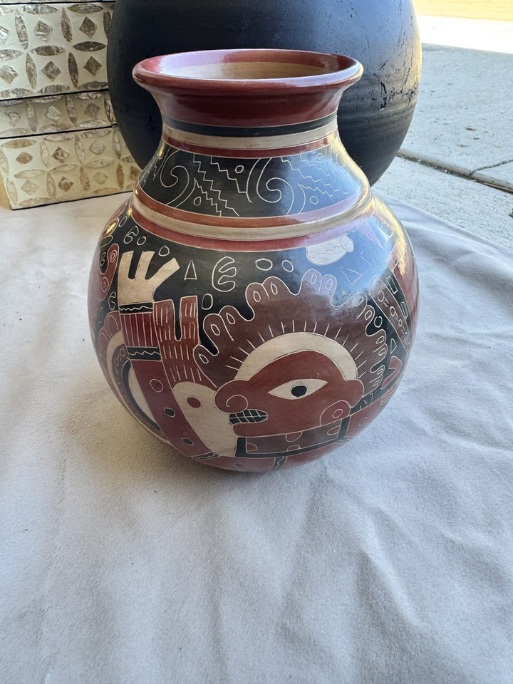 Lot 68 – Signed Nicaraguan Hand-Carved Pottery Vase, 9 in