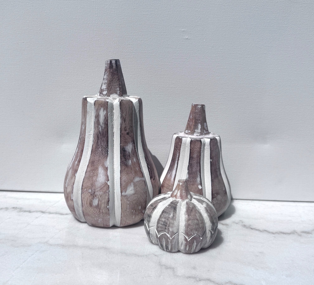 Set of three whitewashed carved wood pumpkins