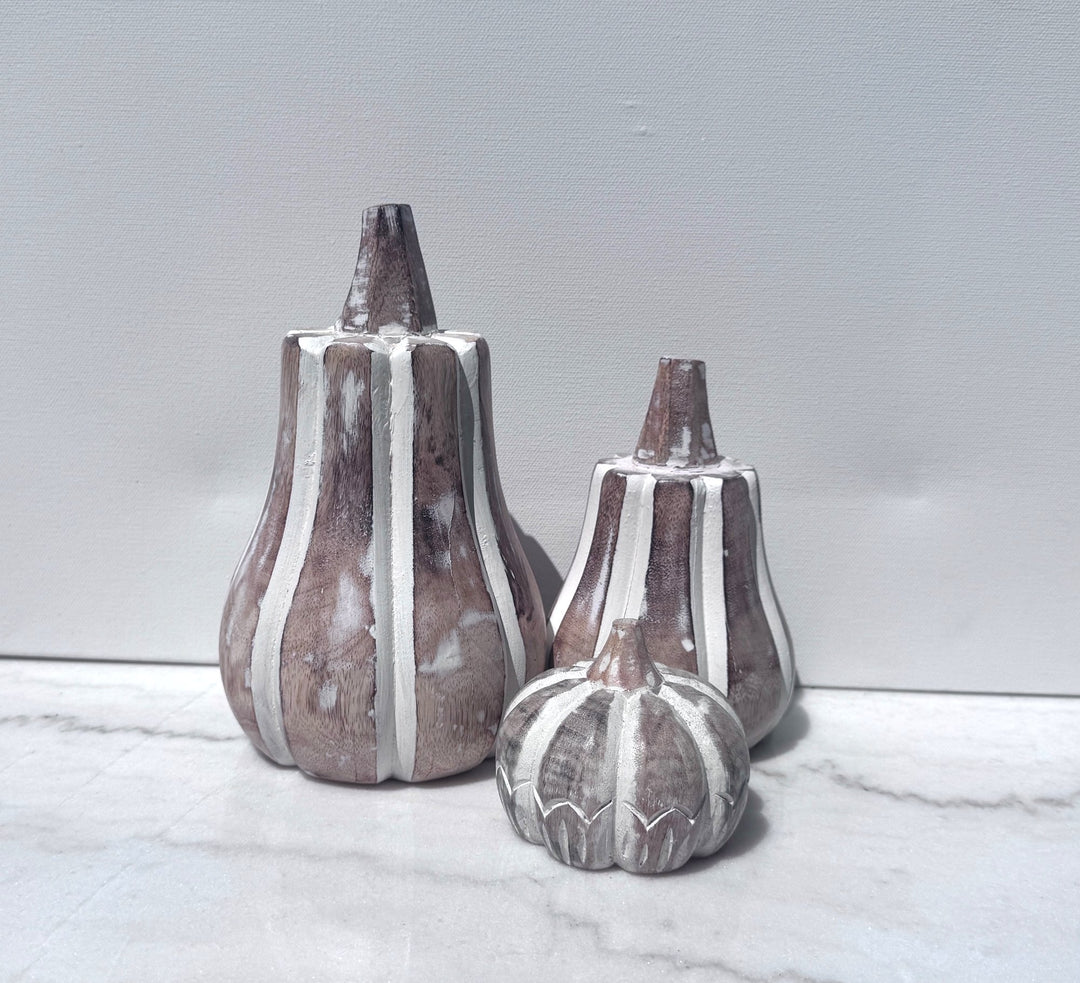 Set of three whitewashed carved wood pumpkins