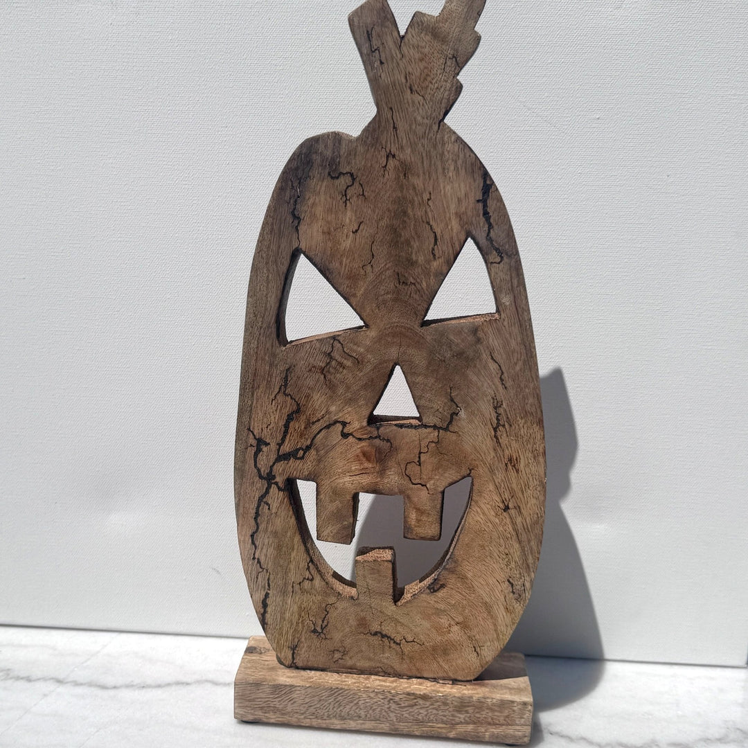 Solid carved wood jack-o-lantern