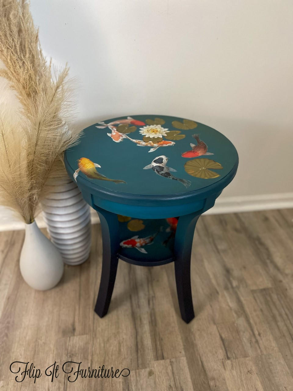 End table painted in Antebellum Blue with a koi fish and lily pad transfer