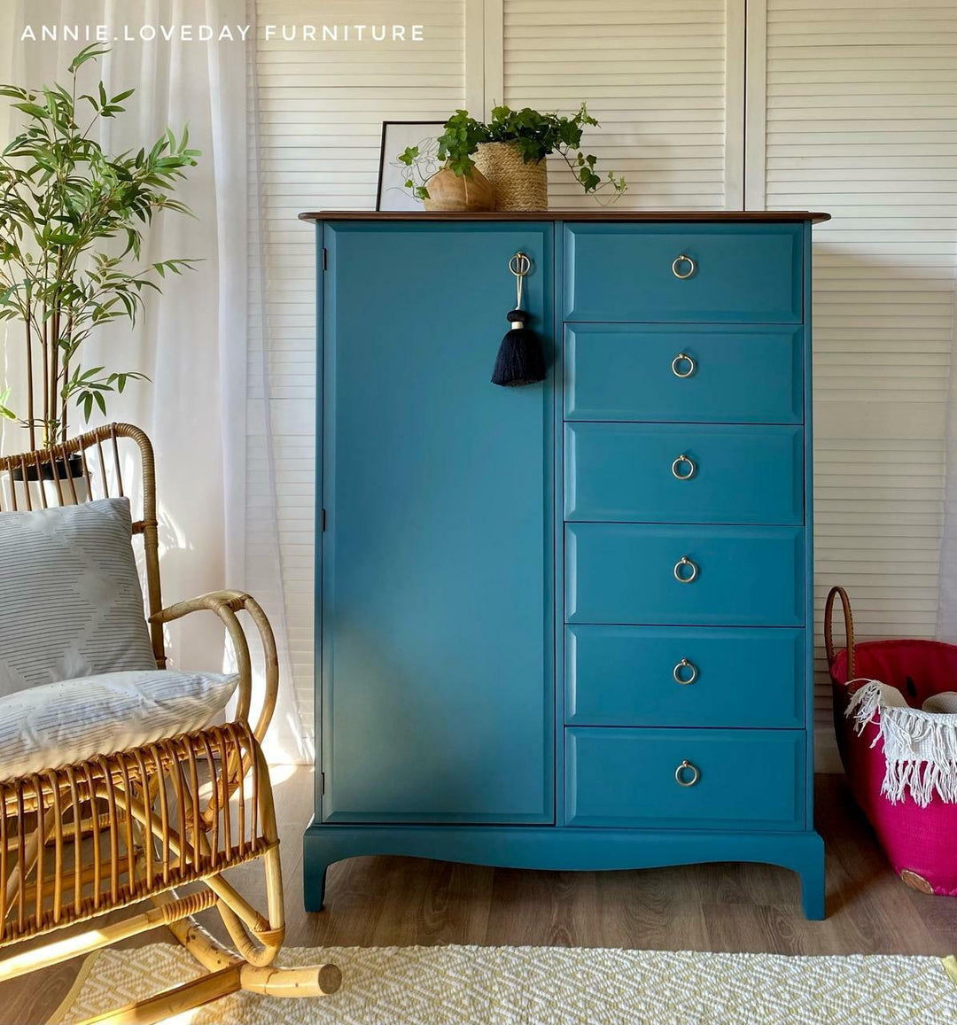 Dresser painted in Antebellum Blue Chalk Mineral Paint styled in a bedroom