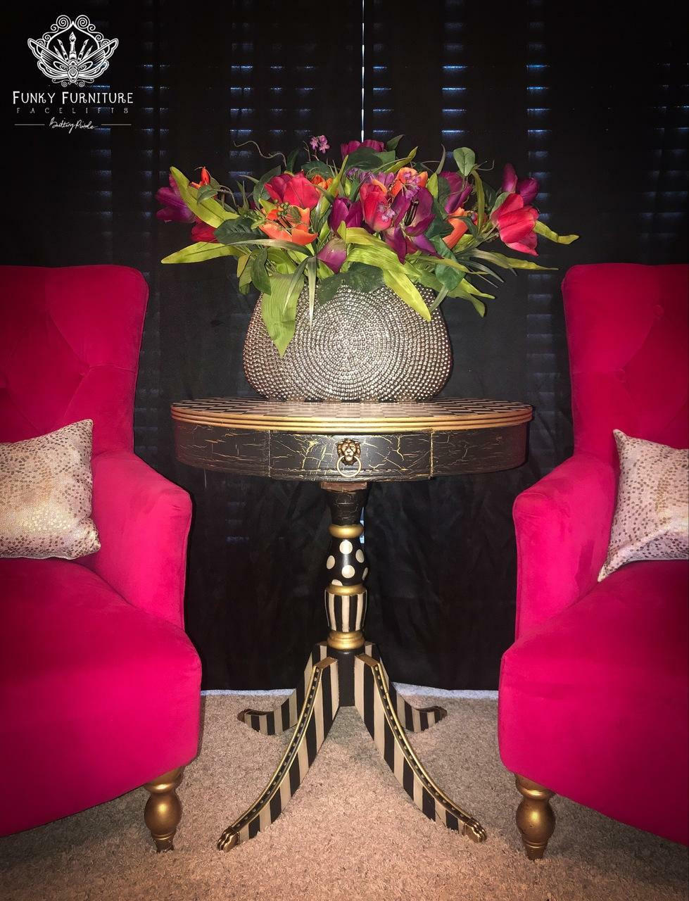 Black painted side table with a crackle finish on the table top