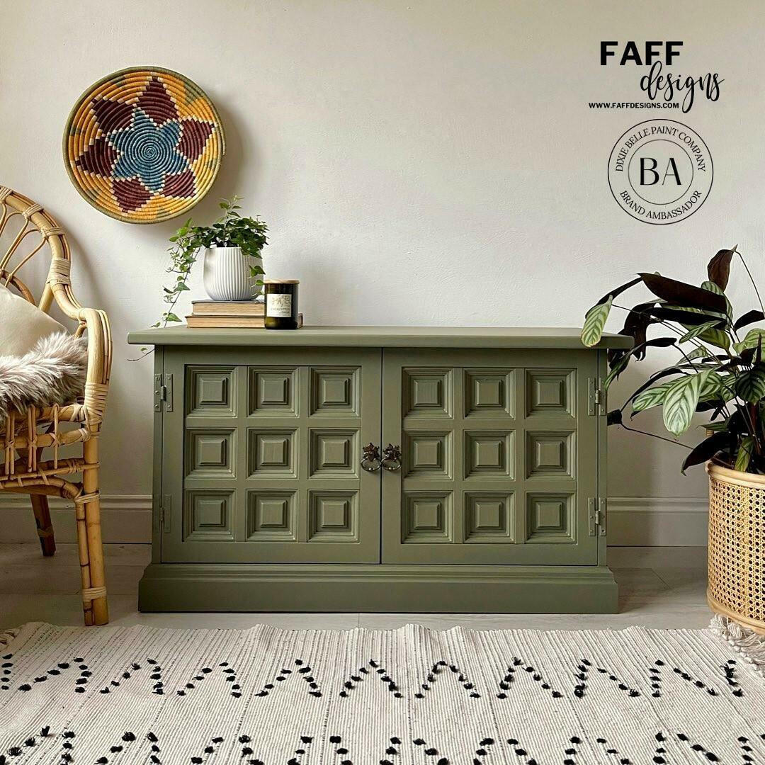 Entertainment center painted in Cactus Silk paint with dark bronze hardware
