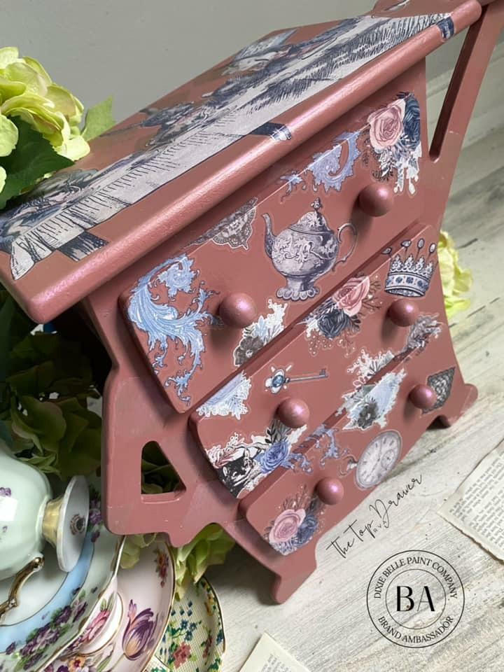 Children's dresser painted in Desert Rose with storybook transfers