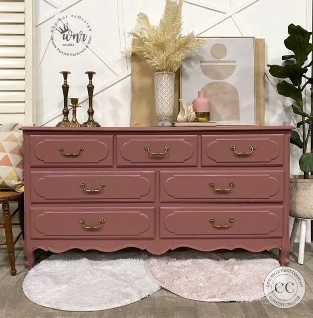Wooden credenza painted in Desert Rose with gold pull knobs