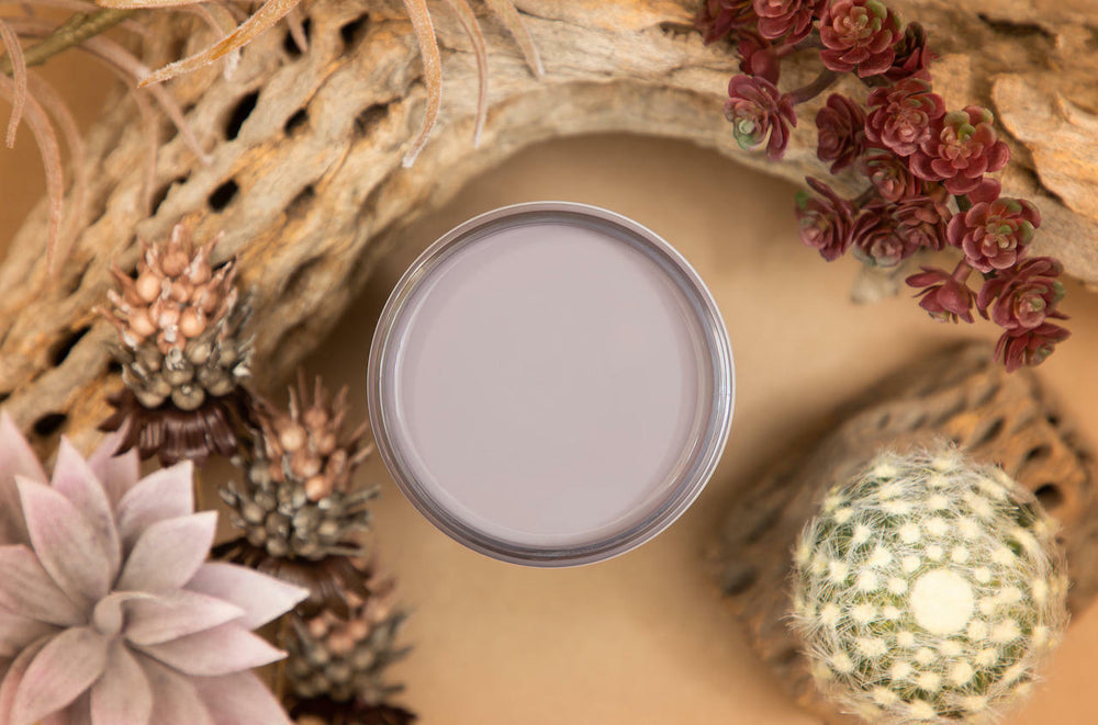 Open jar of Morning Sunrise Silk All-In-One paint, a soft lilac