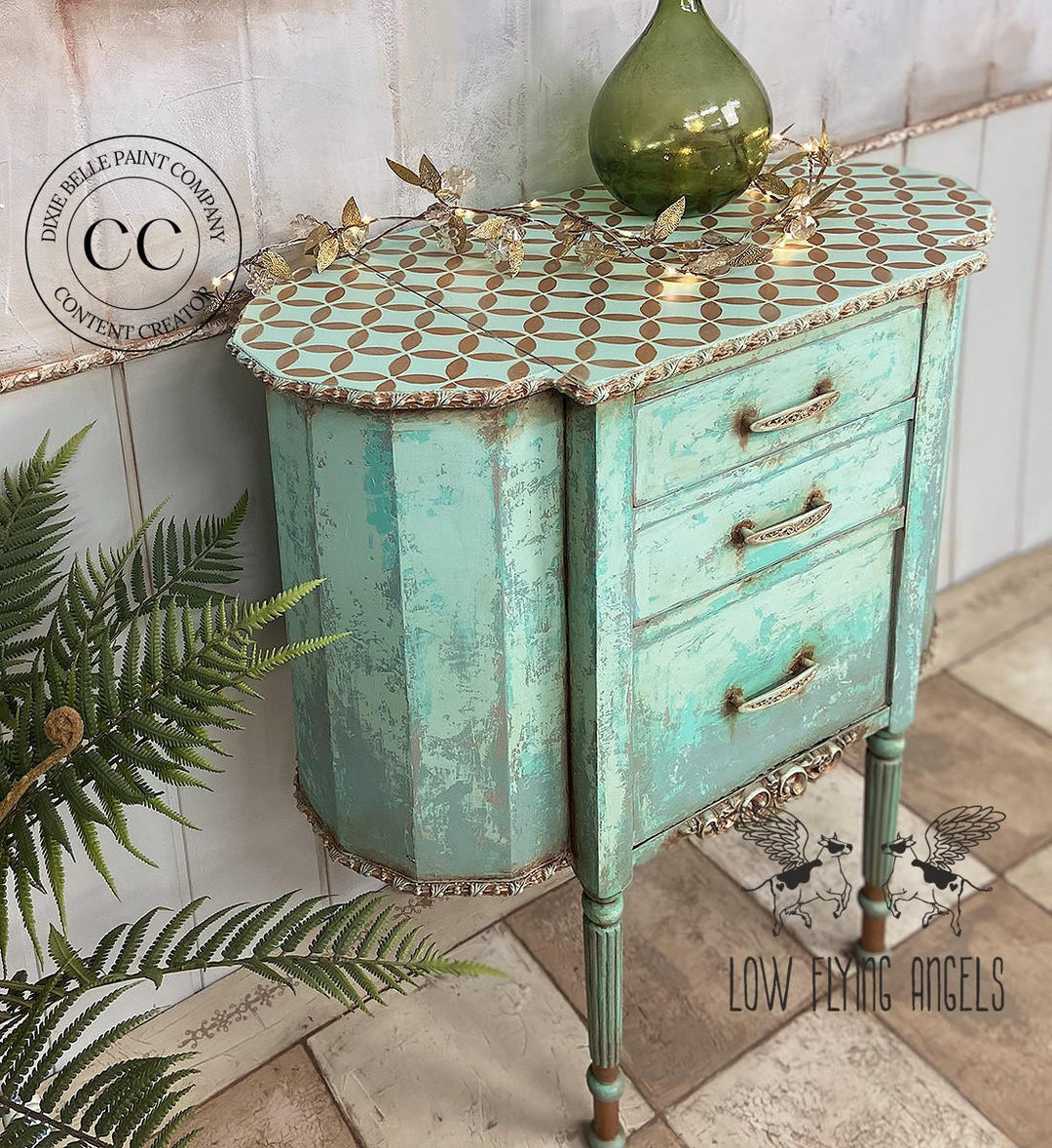 Refurbished cabinet painted in Blue Agave Terra Clay Paint with gold hardware