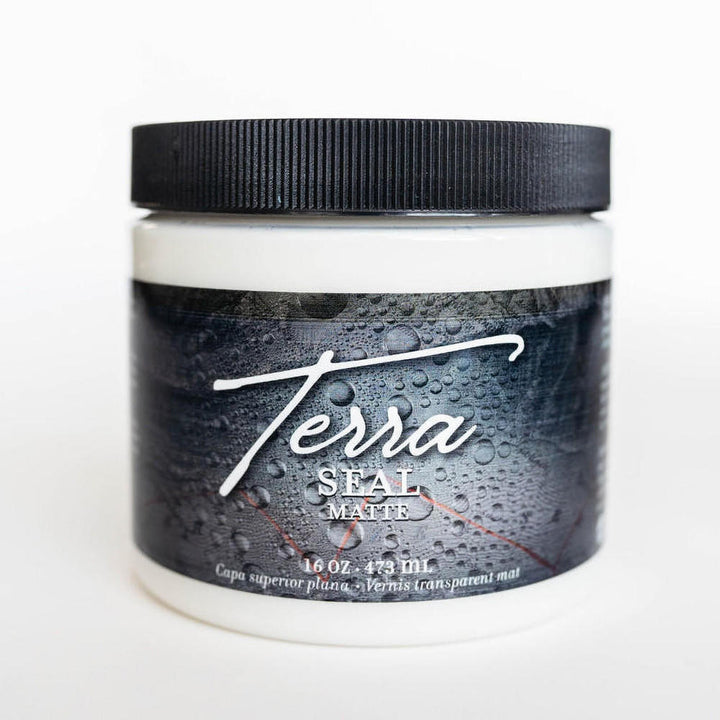 Jar of Dixie Belle Terra Seal clay paint sealer with the lid on